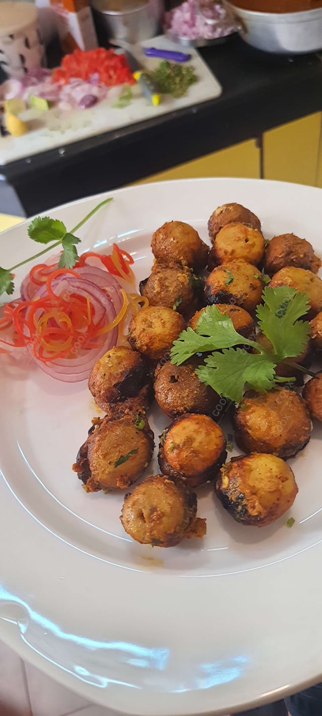 Delicious Mushroom Tikka prepared by COOX