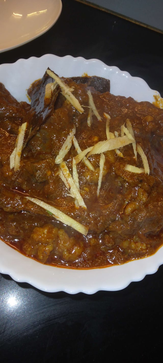 Delicious Mutton Rogan Josh prepared by COOX