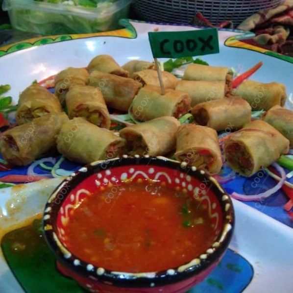 Delicious Veg Spring Rolls prepared by COOX