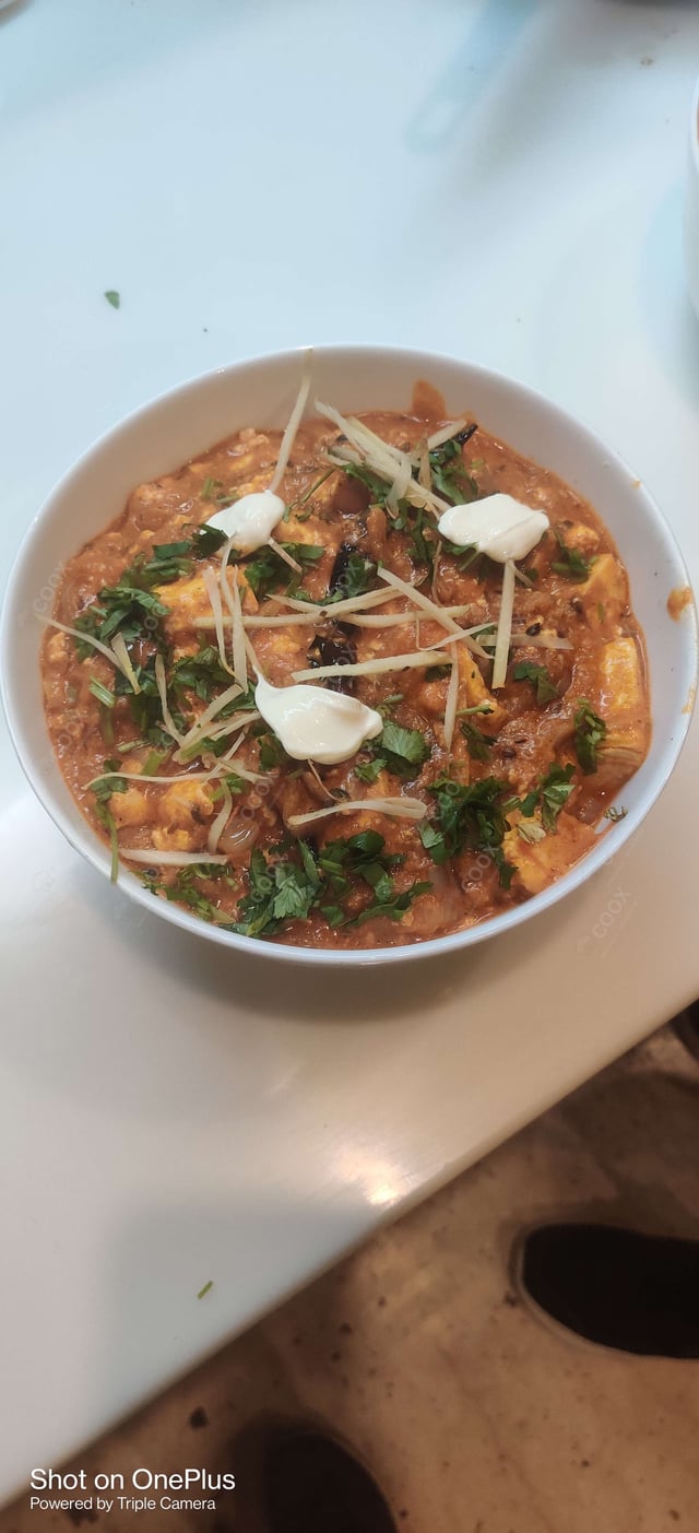 Delicious Kadhai Paneer prepared by COOX