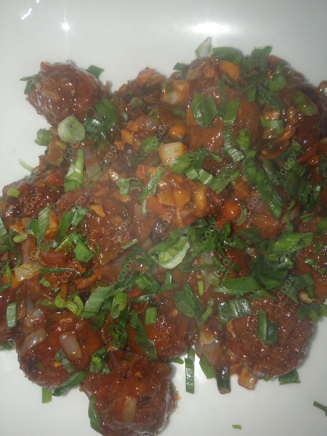 Delicious Veg Manchurian (Dry) prepared by COOX