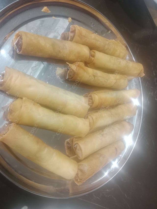 Delicious Veg Spring Rolls prepared by COOX