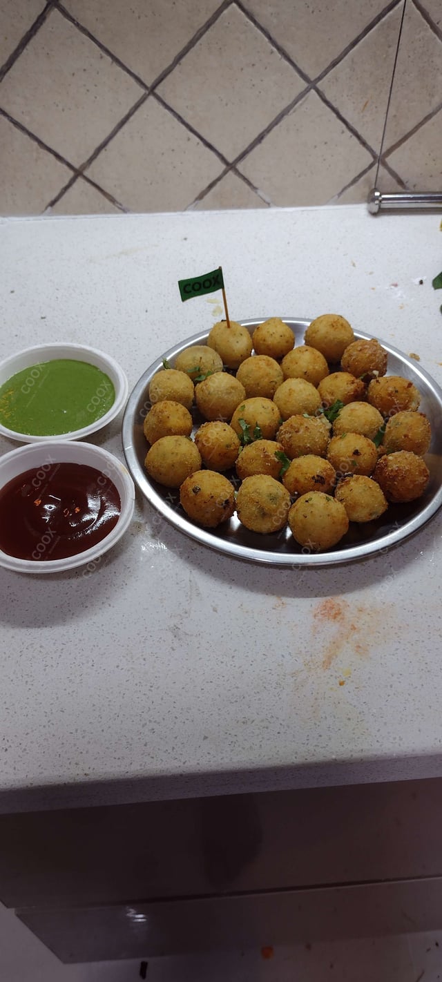 Delicious Fried Cheese Balls prepared by COOX