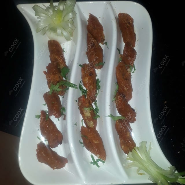 Delicious Mutton Seekh Kebab prepared by COOX