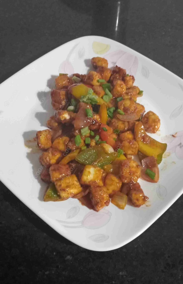 Delicious Chilli Paneer (Dry) prepared by COOX