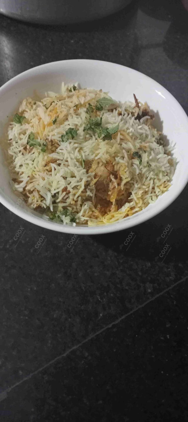 Delicious Chicken Biryani prepared by COOX