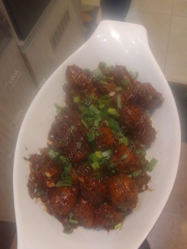 Delicious Veg Manchurian (Dry) prepared by COOX