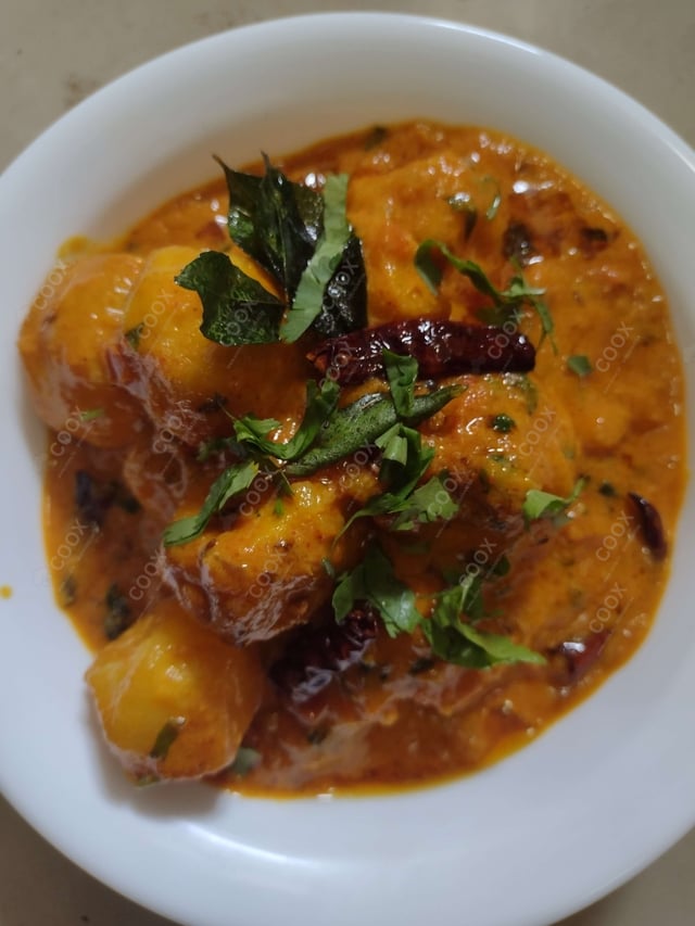 Delicious Dum Aloo prepared by COOX