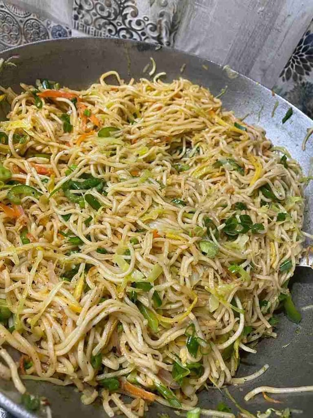 Delicious Veg Hakka Noodles prepared by COOX