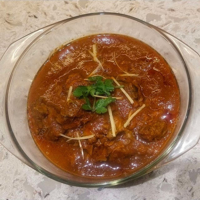 Delicious Mutton Rogan Josh prepared by COOX