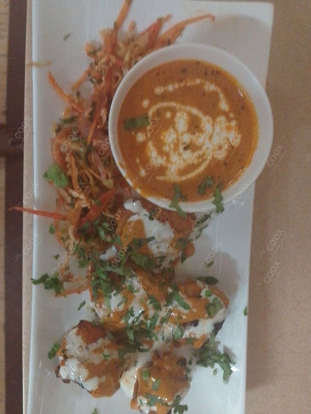 Delicious Murgh Malai Tikka prepared by COOX