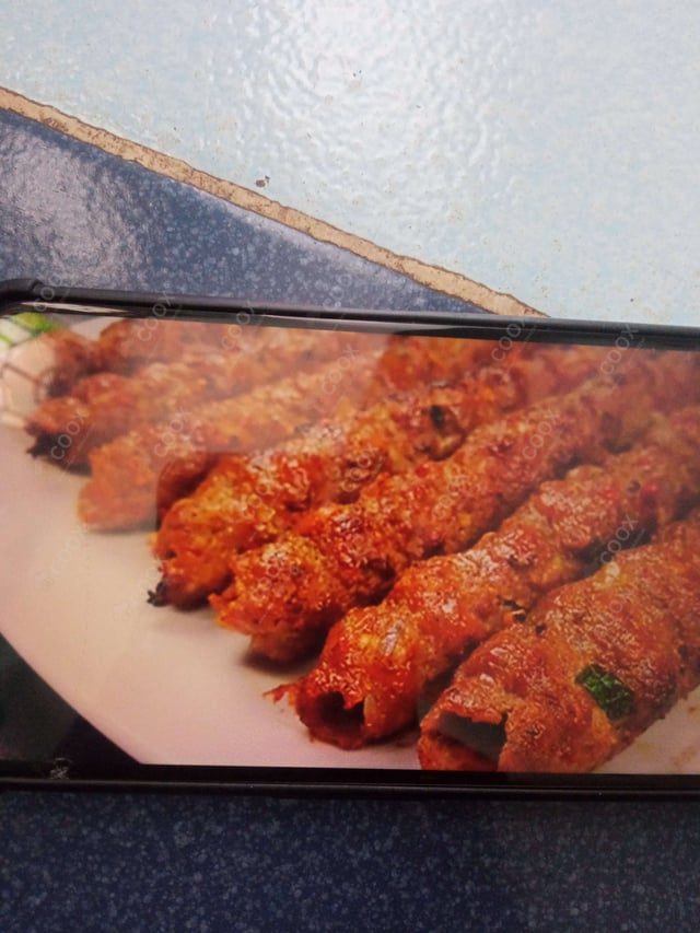 Delicious Mutton Seekh Kebab prepared by COOX