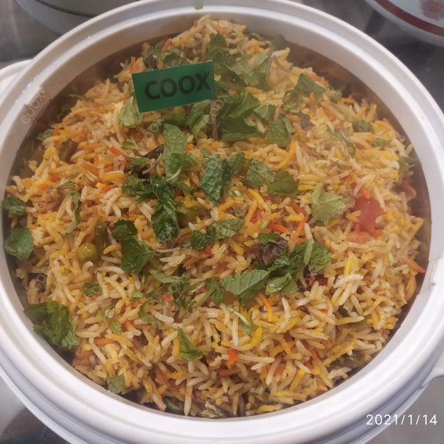 Delicious Veg Biryani prepared by COOX