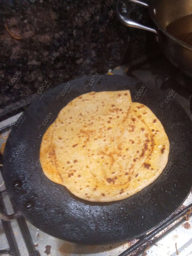 Delicious Lachha Parathas prepared by COOX