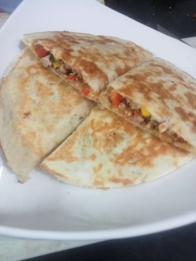 Delicious Chicken Quesadillas prepared by COOX