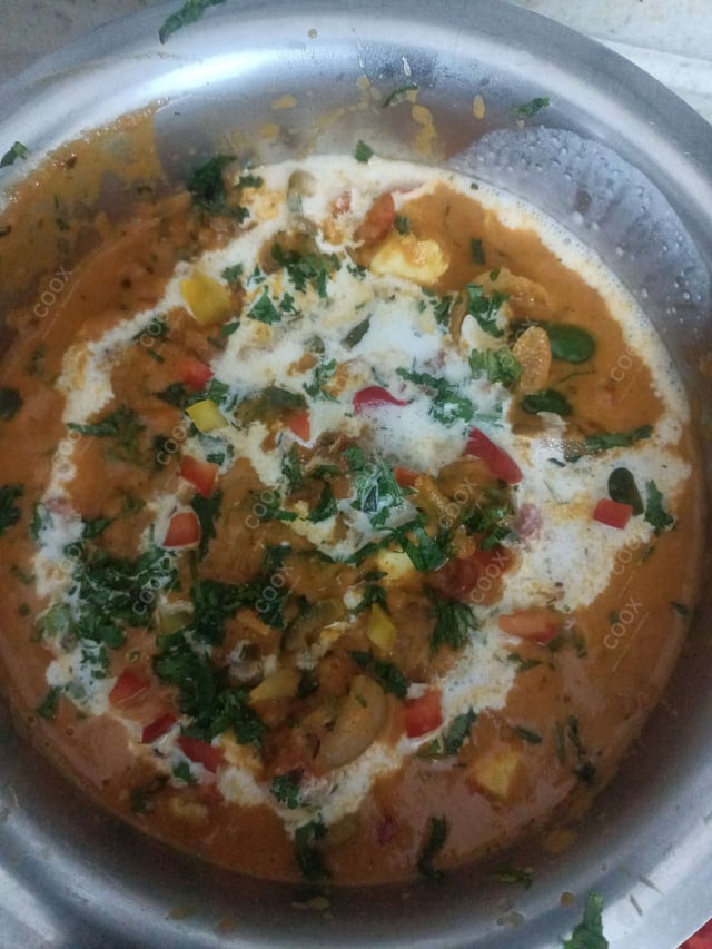 Delicious Kadhai Paneer prepared by COOX