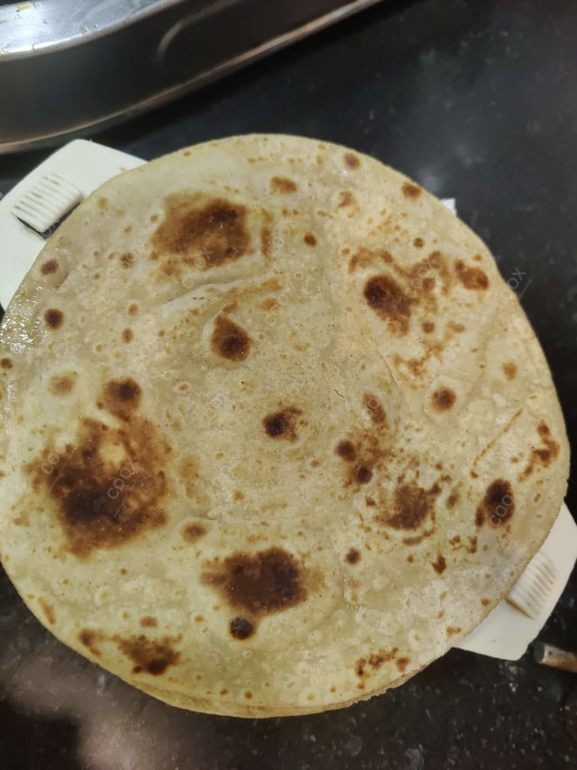 Delicious Lachha Parathas prepared by COOX