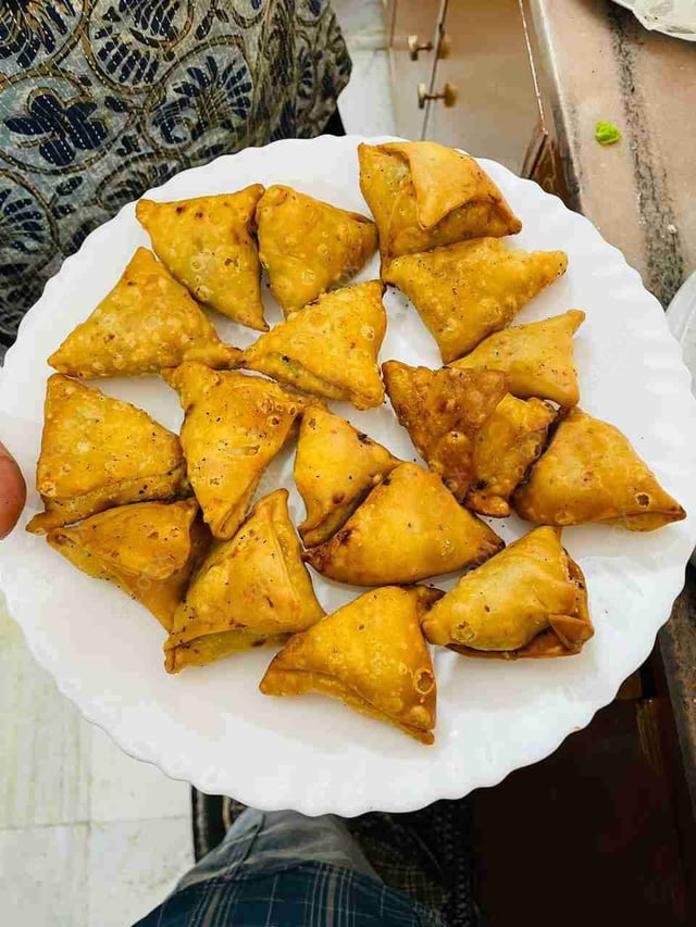 Delicious Mini Samosas prepared by COOX