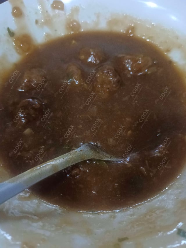 Delicious Veg Manchurian (Gravy) prepared by COOX