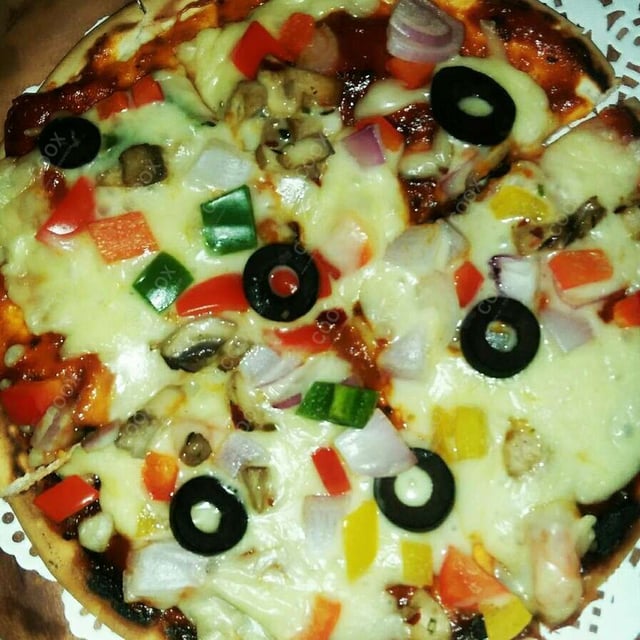 Delicious Classic Veg Pizza prepared by COOX