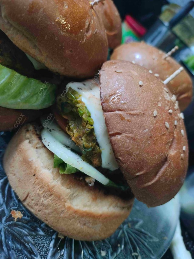 Delicious Mini Veg Burgers prepared by COOX