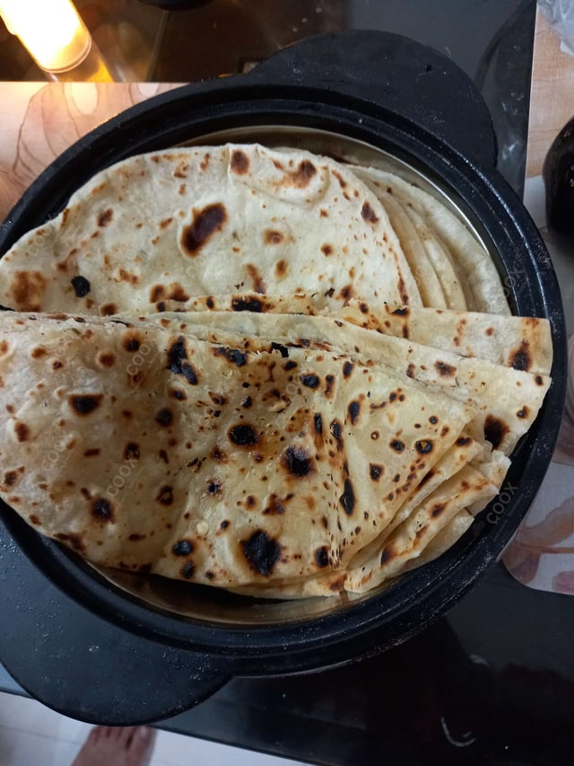 Delicious Naan (Butter / Garlic) prepared by COOX