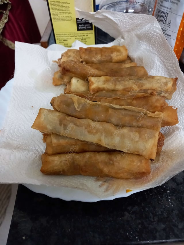 Delicious Veg Spring Rolls prepared by COOX