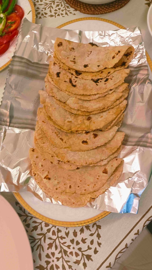 Delicious Makki ki Rotis prepared by COOX