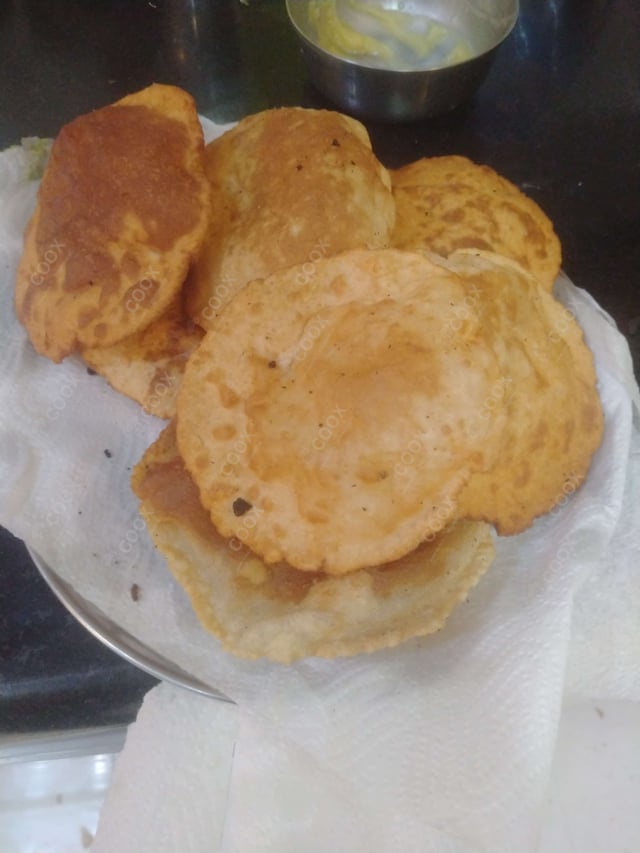 Delicious Pooris & Bedmis prepared by COOX