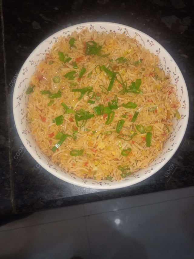 Delicious Veg Fried Rice prepared by COOX