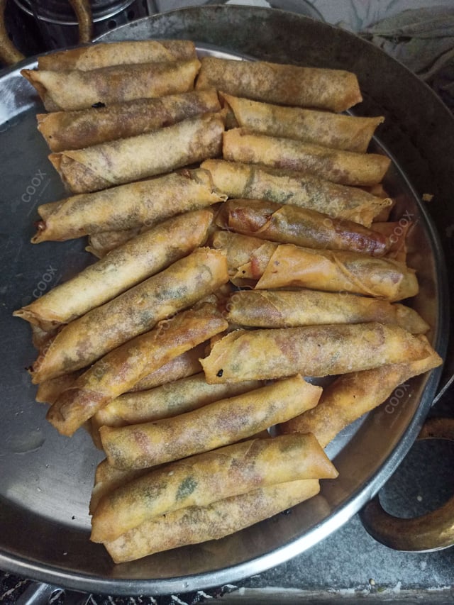 Delicious Veg Spring Rolls prepared by COOX