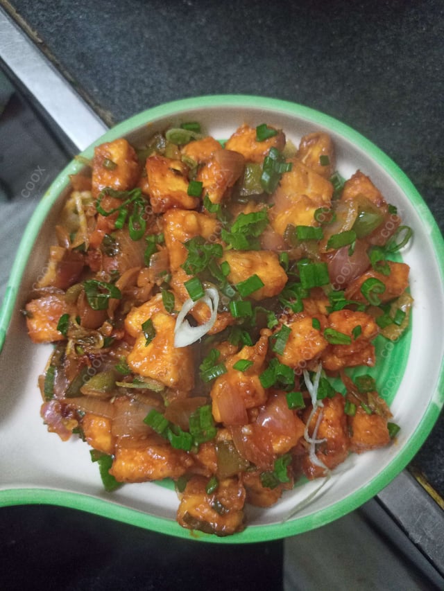 Delicious Chilly Paneer (Dry) prepared by COOX