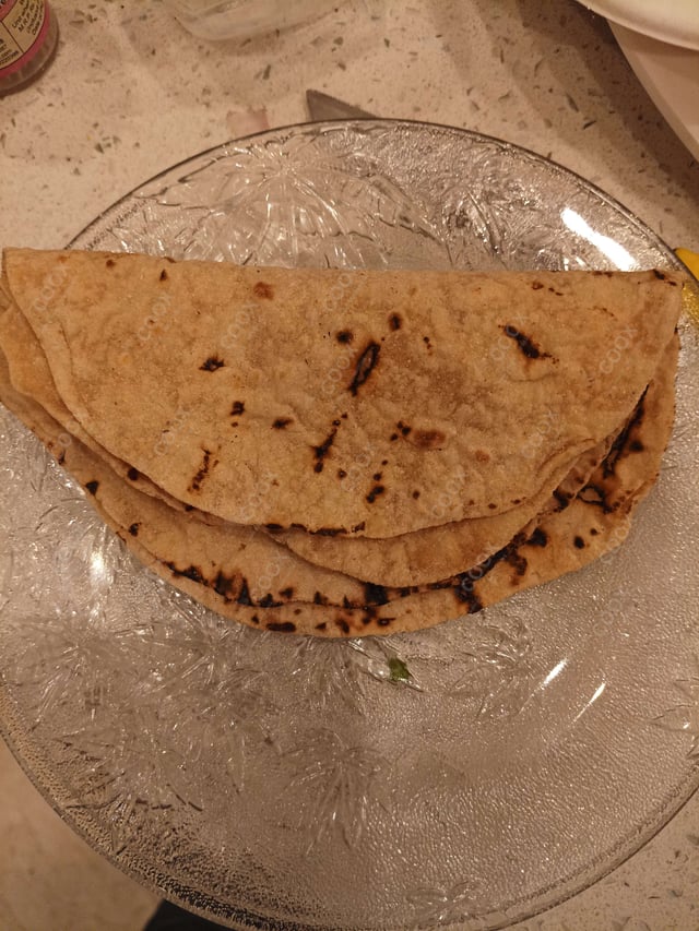 Delicious Tawa Rotis prepared by COOX