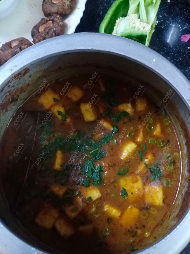 Delicious Matar Paneer prepared by COOX