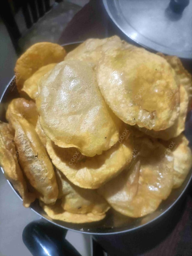 Delicious Pooris & Bedmis prepared by COOX