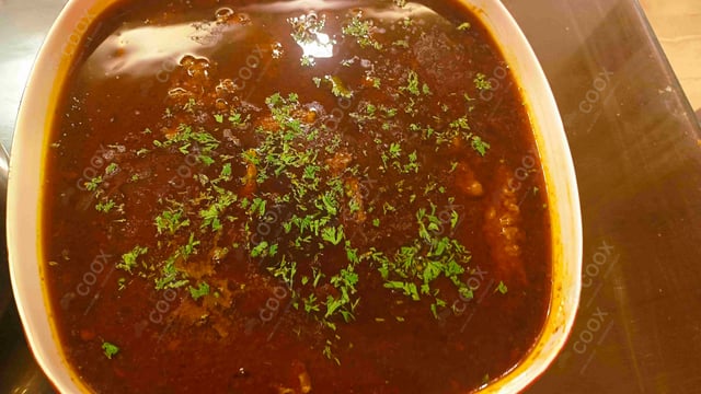 Delicious Mutton Rogan Josh prepared by COOX