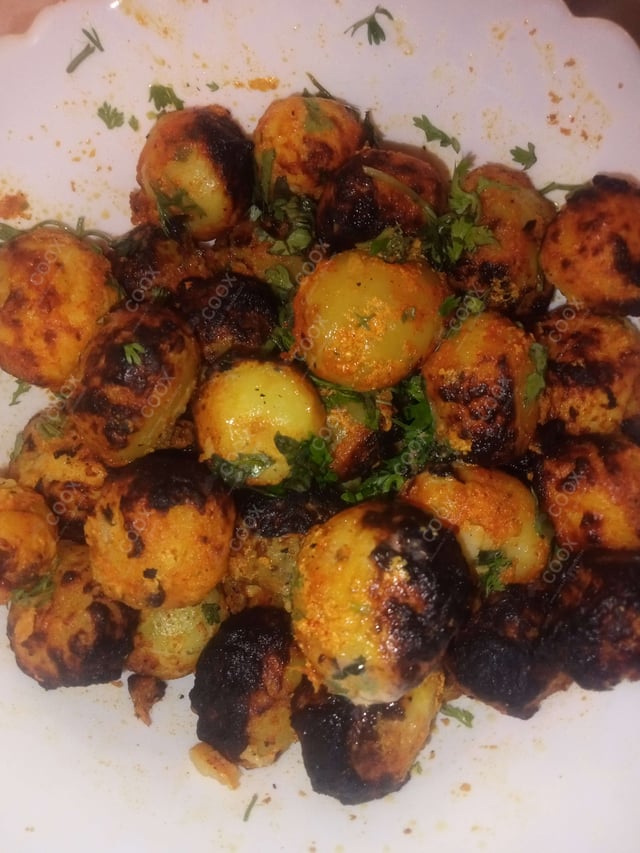 Delicious Tandoori Aloo prepared by COOX