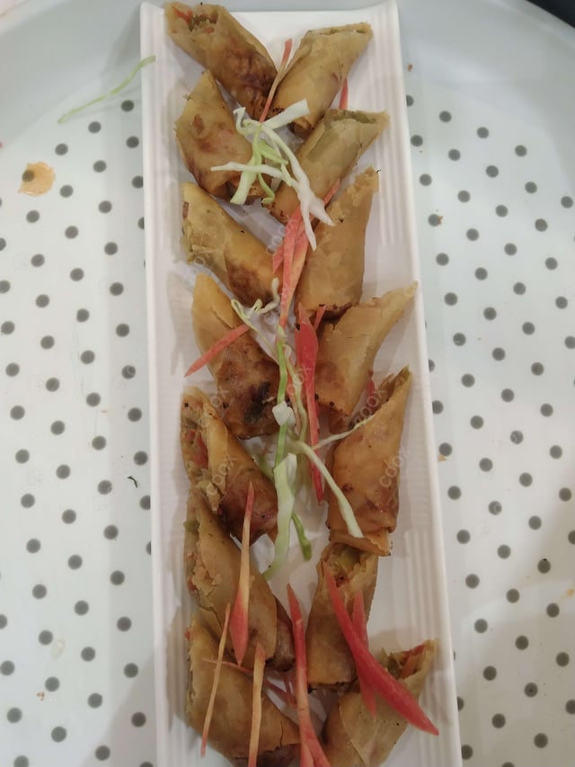 Delicious Veg Spring Rolls prepared by COOX