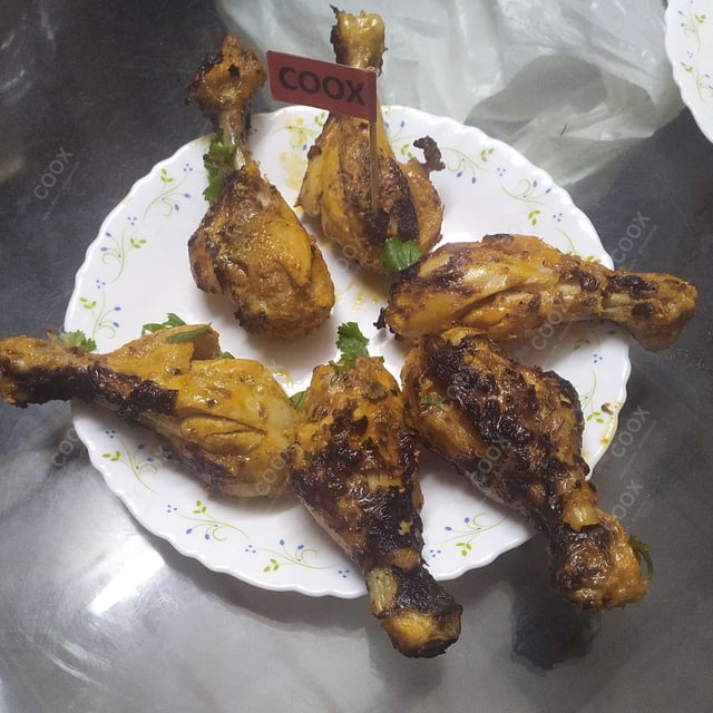 Delicious Tandoori Chicken prepared by COOX