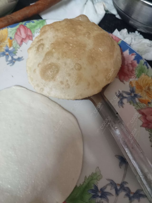 Delicious Bhature prepared by COOX