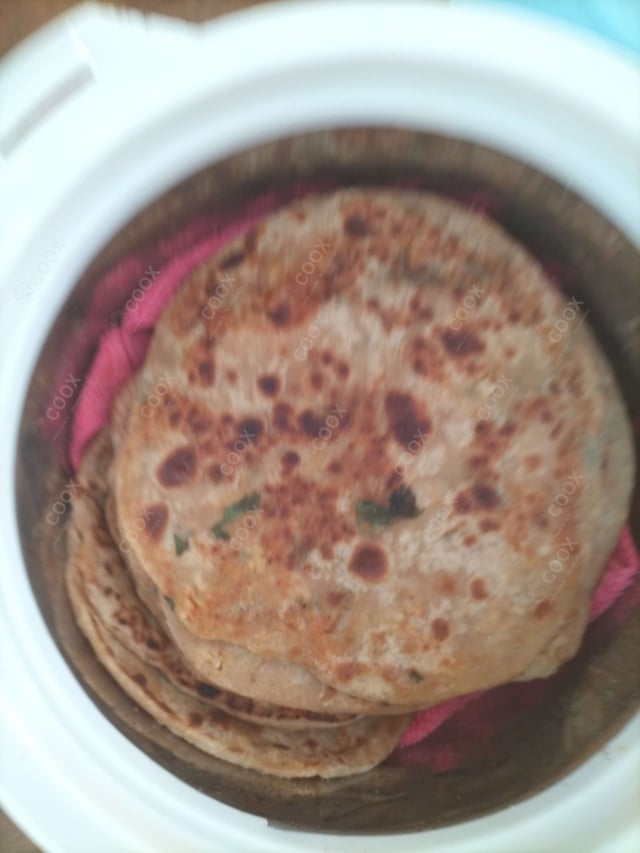 Delicious Stuffed Paranthas prepared by COOX