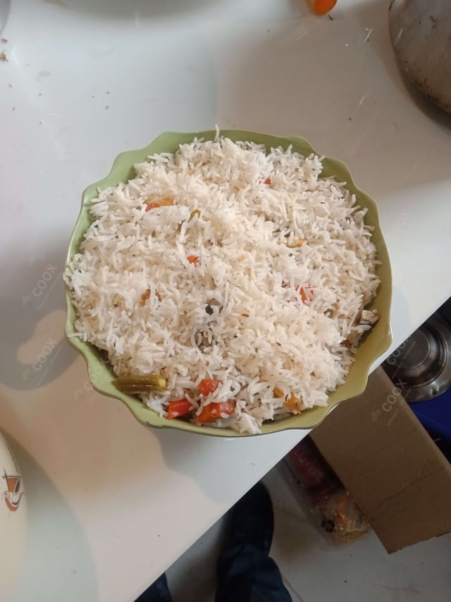 Delicious Veg Biryani prepared by COOX