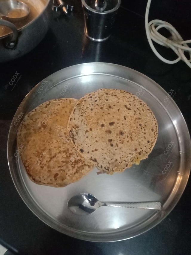 Delicious Stuffed Paranthas prepared by COOX