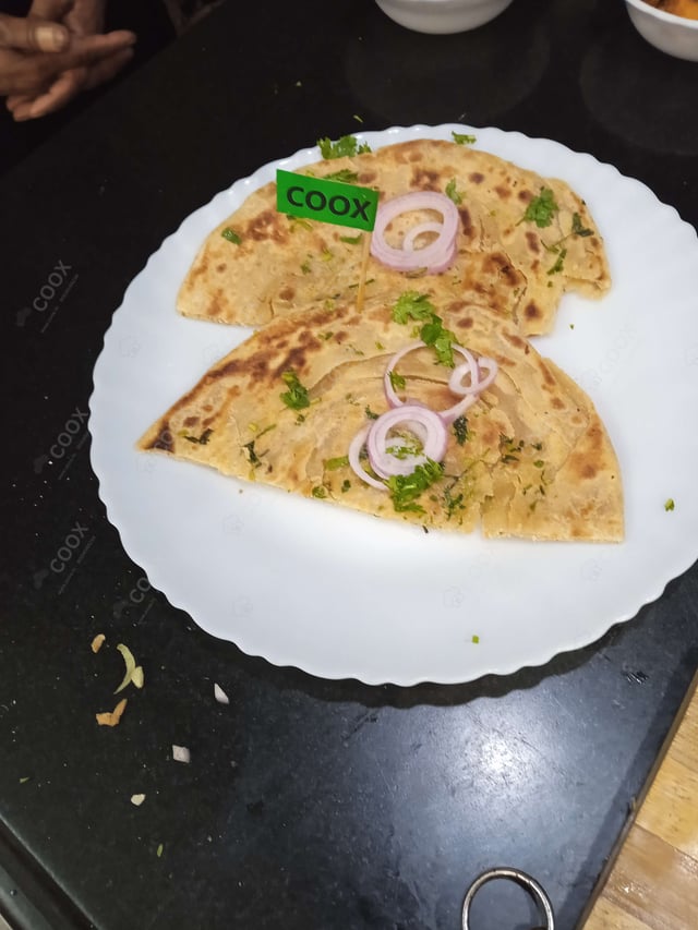 Delicious Lachha Paranthas & Rotis prepared by COOX