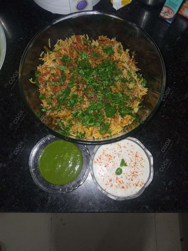 Delicious Veg Biryani prepared by COOX