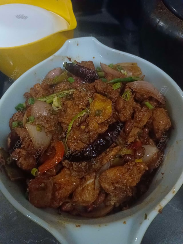 Delicious Kung Pao Chicken prepared by COOX