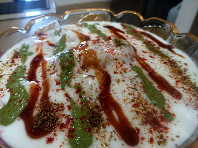 Delicious Dahi Bhalla prepared by COOX