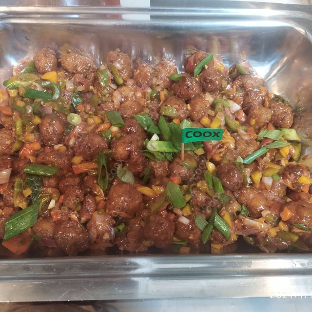 Delicious Veg Manchurian (Dry) prepared by COOX