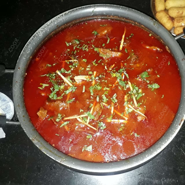 Delicious Mutton Rogan Josh prepared by COOX