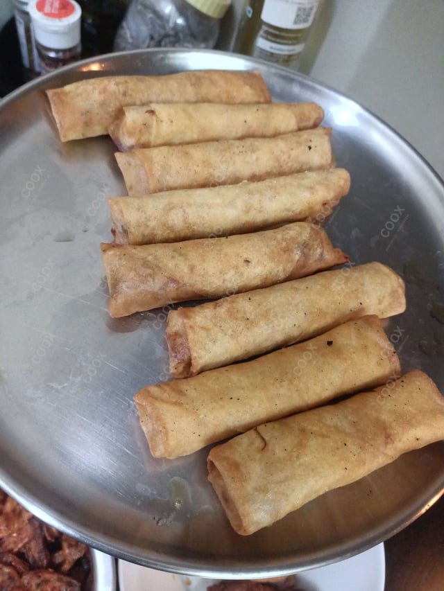 Delicious Chicken Spring Rolls prepared by COOX